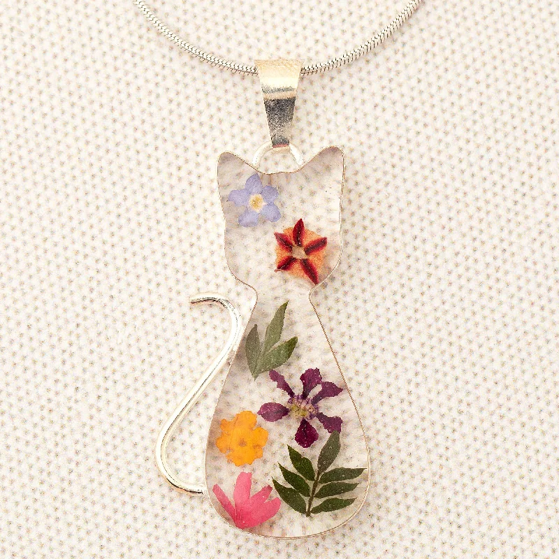 - Air box TSA certified check-inReal Flowers & Sterling Cat Necklace